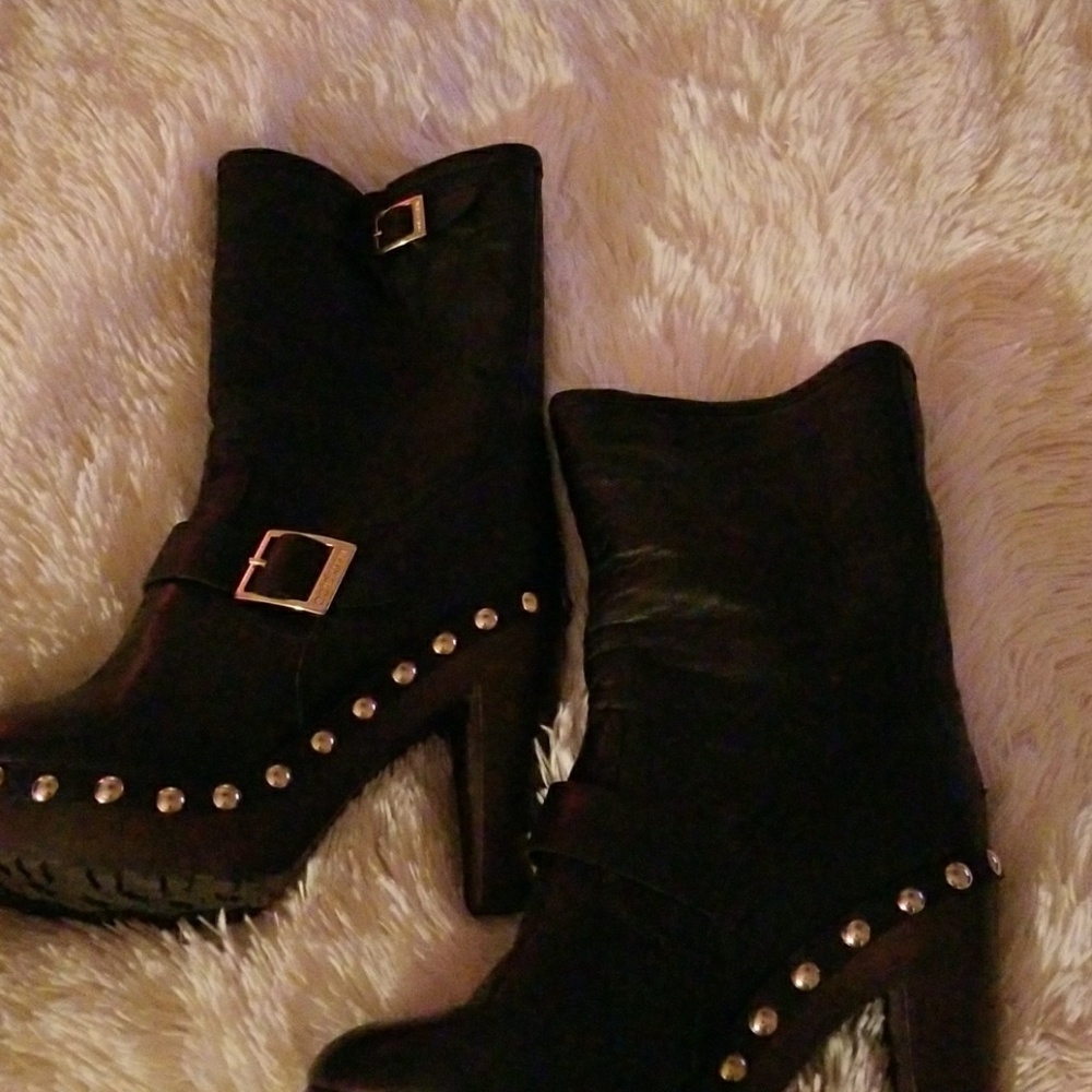 Jimmy Choo fur lined boots.